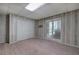 Bedroom with a window and closet provides a comfortable and private space for relaxation and personal activities at 5894 Highway 20 Ne, Cartersville, GA 30121