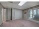 Bright bedroom featuring built in shelving, and a window providing views and natural light, enhancing its appeal at 5894 Highway 20 Ne, Cartersville, GA 30121