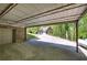 Spacious carport area with brick facade and ample parking space at 5894 Highway 20 Ne, Cartersville, GA 30121
