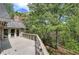Spacious deck with wooded backyard view, perfect for outdoor relaxation and entertaining at 5894 Highway 20 Ne, Cartersville, GA 30121