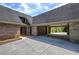 Brick home featuring a covered carport area offering ample parking and views of the surrounding nature at 5894 Highway 20 Ne, Cartersville, GA 30121