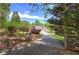 Charming single-Gathering home with a lush front yard and winding driveway, offering privacy and curb appeal at 5894 Highway 20 Ne, Cartersville, GA 30121