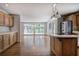 Bright kitchen featuring a central island, breakfast bar, and scenic view at 5894 Highway 20 Ne, Cartersville, GA 30121