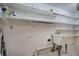 Laundry room with ample shelving and a utility sink, ready for all your laundry needs at 5894 Highway 20 Ne, Cartersville, GA 30121