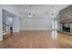 Large living room boasting hardwood floors, a fireplace, and seamless transition to other living spaces at 5894 Highway 20 Ne, Cartersville, GA 30121