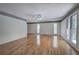 Living room with hardwood floors and natural light from large windows at 5894 Highway 20 Ne, Cartersville, GA 30121