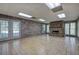 Spacious living room boasts a brick fireplace and multiple windows for natural light at 5894 Highway 20 Ne, Cartersville, GA 30121