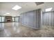 Spacious living room featuring a fireplace, tiled floors, and ample natural light at 5894 Highway 20 Ne, Cartersville, GA 30121