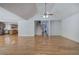 Bright and open living room with hardwood floors, staircase, and seamless access to the kitchen at 5894 Highway 20 Ne, Cartersville, GA 30121