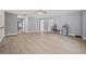 Spacious bonus room with hardwood floors and neutral paint is ready to be customized at 4505 Lakefield Bnd, Berkeley Lake, GA 30096