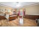 Comfortable main bedroom with hardwood floors, neutral walls, and plenty of natural light at 4505 Lakefield Bnd, Berkeley Lake, GA 30096
