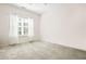 Bedroom featuring soft carpet, bright windows with blinds, and spacious layout at 4573 Caleb Xing # 20, Powder Springs, GA 30127