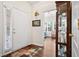 Entryway featuring a white door, tile floor, and a view into the living room at 4573 Caleb Xing # 20, Powder Springs, GA 30127