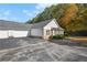 Charming home featuring a two-car garage and a well-maintained yard at 4573 Caleb Xing # 20, Powder Springs, GA 30127