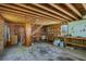 Unfinished basement with wooden beams, peg board, utility sink, and concrete floor provides a versatile space at 313 Ellenwood Dr, Bowdon, GA 30108
