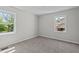 Bedroom with carpet, natural light, and new windows at 313 Ellenwood Dr, Bowdon, GA 30108
