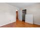 Bedroom with wood floors, closet, and doorway at 3944 Woburn Dr, Tucker, GA 30084