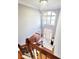 Elegant foyer featuring staircase, hardwood floors, and a chandelier at 505 Tilbury Dr, Suwanee, GA 30024