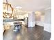 Kitchen features an island with seating, stainless steel appliances, and pendant lighting at 505 Tilbury Dr, Suwanee, GA 30024