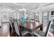 Open dining room area with hardwood floors, plenty of natural light and connecting rooms at 725 Mcwilliams Se Rd, Atlanta, GA 30315