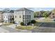 Two-story house showcasing a charming exterior with dual porches, attached garage and landscaping at 725 Mcwilliams Se Rd, Atlanta, GA 30315
