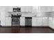 Well-appointed kitchen with stainless steel appliances, tile backsplash, and modern finishes at 725 Mcwilliams Se Rd, Atlanta, GA 30315