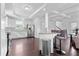 Modern kitchen with white cabinets, stainless steel appliances, and hardwood floors at 725 Mcwilliams Se Rd, Atlanta, GA 30315