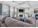 Cozy living room featuring a fireplace, coffered ceiling, and large windows at 725 Mcwilliams Se Rd, Atlanta, GA 30315