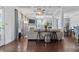 Open living space with a fireplace, hardwood floors, modern decor, and lots of natural light at 725 Mcwilliams Se Rd, Atlanta, GA 30315