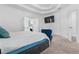 Bright main bedroom featuring a tray ceiling and an ensuite bathroom at 725 Mcwilliams Se Rd, Atlanta, GA 30315
