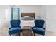 Comfortable main bedroom with a sitting area and plush furnishings at 725 Mcwilliams Se Rd, Atlanta, GA 30315
