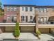 Exterior townhome view featuring drive-under garages and balconies at 2808 Broughton Se Ln, Atlanta, GA 30339