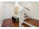 Foyer with wood flooring and a staircase, offering ample space for organizing at 2808 Broughton Se Ln, Atlanta, GA 30339