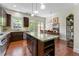 Well-appointed kitchen with a large island, wood cabinets, and stainless steel appliances at 2808 Broughton Se Ln, Atlanta, GA 30339