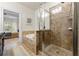 A luxurious main bathroom with a separate shower and soaking tub at 2808 Broughton Se Ln, Atlanta, GA 30339
