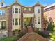 Beautiful brick townhouse with a symmetrical facade and inviting entryway at 2808 Broughton Se Ln, Atlanta, GA 30339
