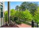 Stunning porch view framed by elegant pillars and lush greenery, inviting relaxation and tranquility at 2808 Broughton Se Ln, Atlanta, GA 30339