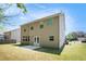 The backyard of this home has a concrete patio and a large grassy area at 362 Lanier Ct, Hiram, GA 30141