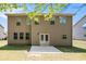This home has a large backyard with a concrete patio and many windows that let in natural light at 362 Lanier Ct, Hiram, GA 30141