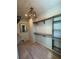 Spacious walk-in closet with custom shelving, drawers, and contemporary lighting at 3960 Clairmont Rd # 2, Chamblee, GA 30341
