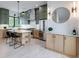 Spacious kitchen featuring green cabinets, stainless steel appliances, and a marble island with seating at 3960 Clairmont Rd # 2, Chamblee, GA 30341