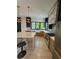 Bright kitchen featuring stainless steel appliances, pendant lights, and a large marble island at 3960 Clairmont Rd # 2, Chamblee, GA 30341