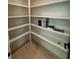 Walk-in pantry featuring ample shelving for organized storage at 3960 Clairmont Rd # 2, Chamblee, GA 30341
