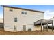 Back exterior featuring siding, deck, basement access, and yard at 4153 Island View Ct, Decatur, GA 30034