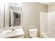 Bright bathroom with a single vanity, toilet, and shower-tub combo at 4153 Island View Ct, Decatur, GA 30034