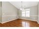 Dining area showcases hardwood floors, elegant lighting, and ample natural light at 4153 Island View Ct, Decatur, GA 30034