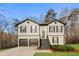 Charming two-story home boasts a two-car garage and well-maintained landscaping at 4153 Island View Ct, Decatur, GA 30034