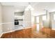 Open floor plan flows from dining area into kitchen with white cabinets at 4153 Island View Ct, Decatur, GA 30034