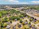 Extensive aerial view capturing the layout of a suburban community with highway access and commercial zones at 1650 Willow River Run, Grayson, GA 30017