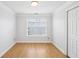 Bedroom offering modern floors, natural light and a door to the closet at 1650 Willow River Run, Grayson, GA 30017